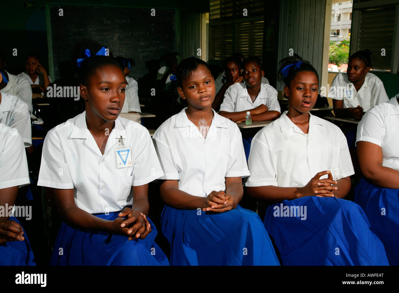 Girls wearing school uniforms at a training centre for young women in New  Amsterdam, Guyana, South America Stock Photo - Alamy