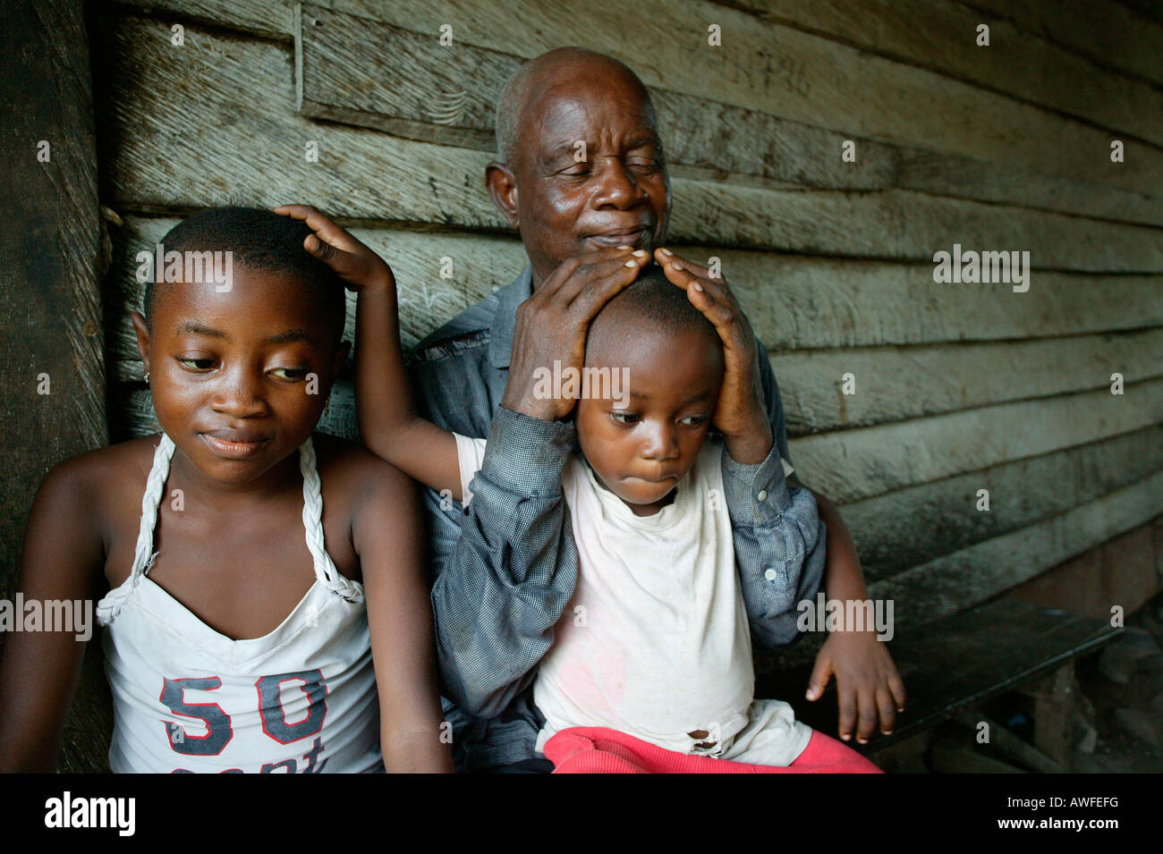 Grandparents and their grandchildren, AIDS orphans, Cameroon, Africa Stock Photo