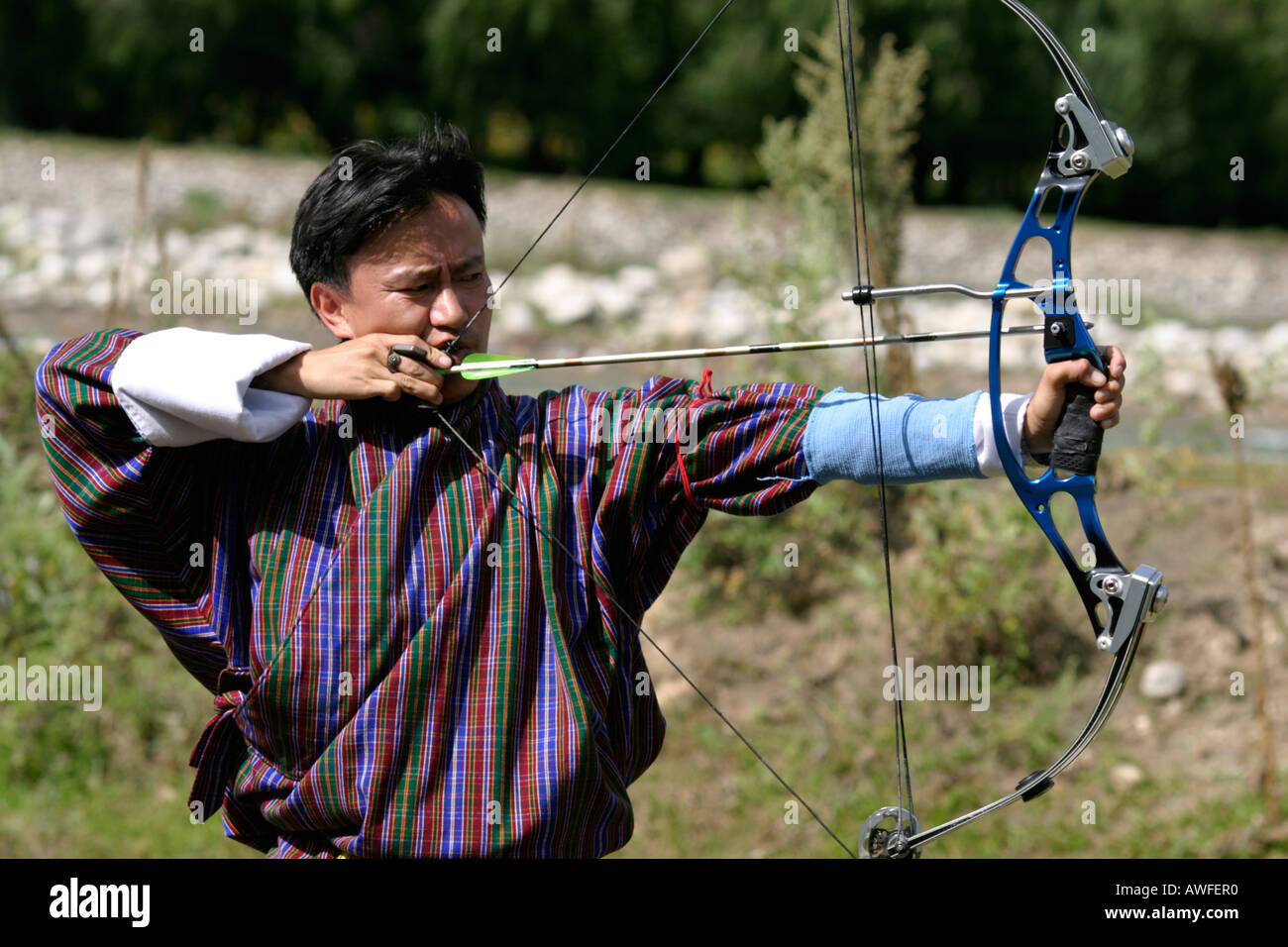 Bhutanese archer during a contest, Bhutan Stock Photo Alamy