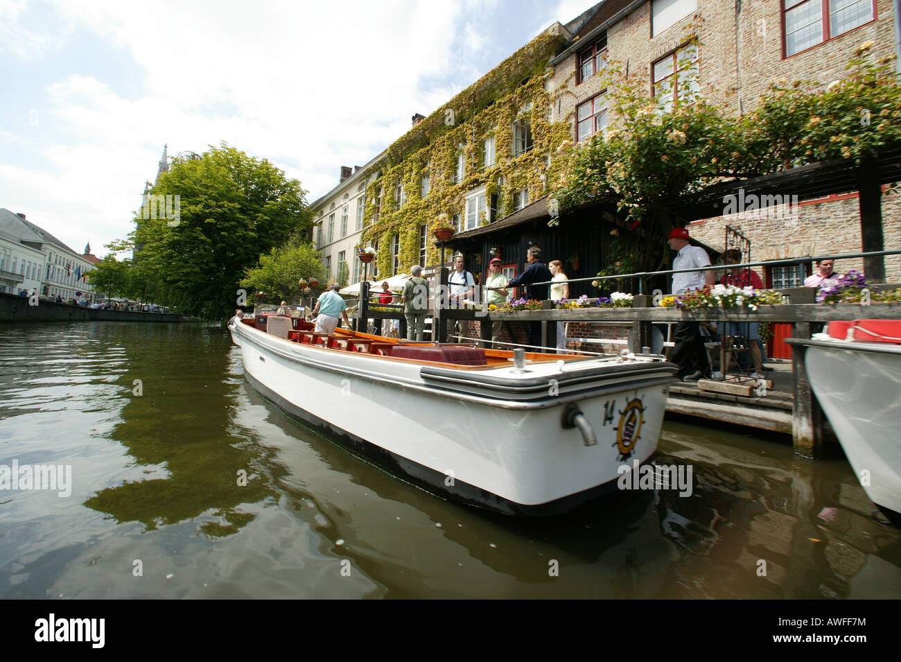 Tourist boat in the canal, Bruges, Flanders, Belgium, Europe Stock Photo
