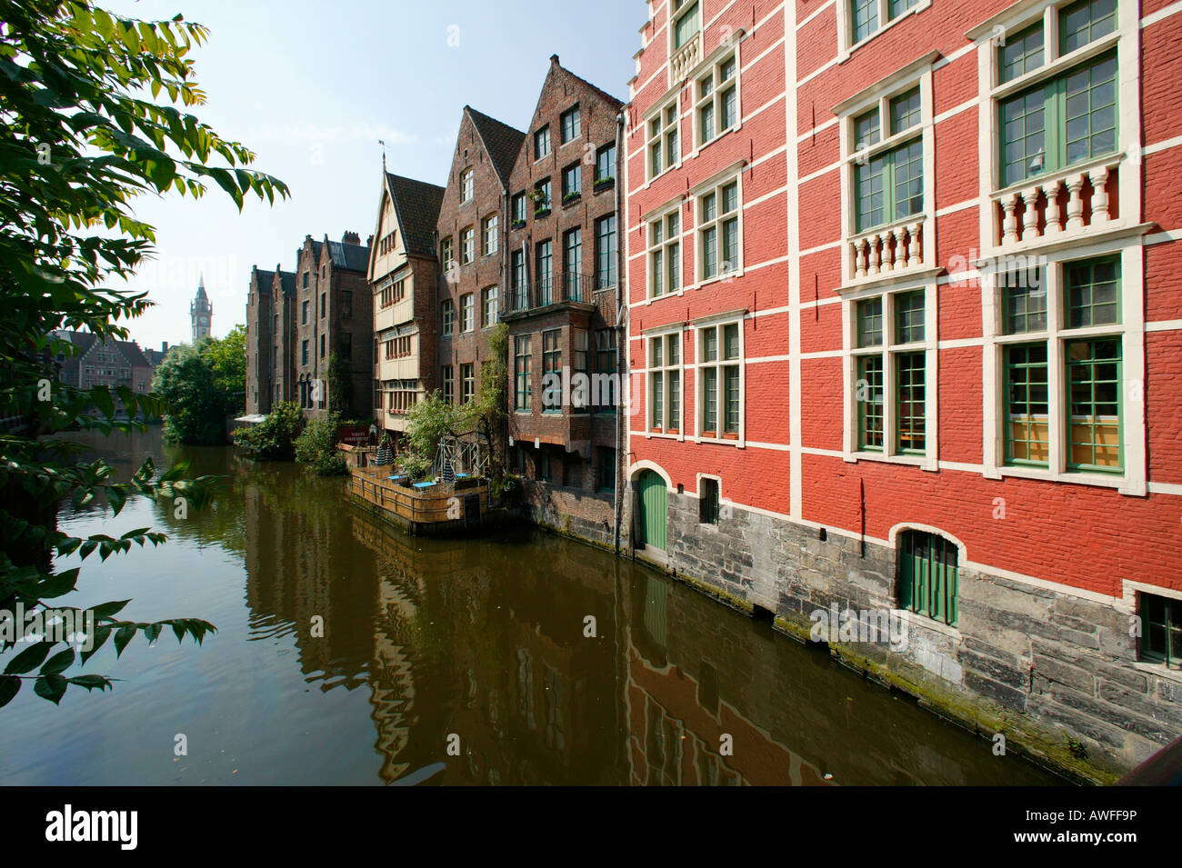 Town houses lining a canal in Ghent, East Flanders, Belgium, Europe Stock Photo