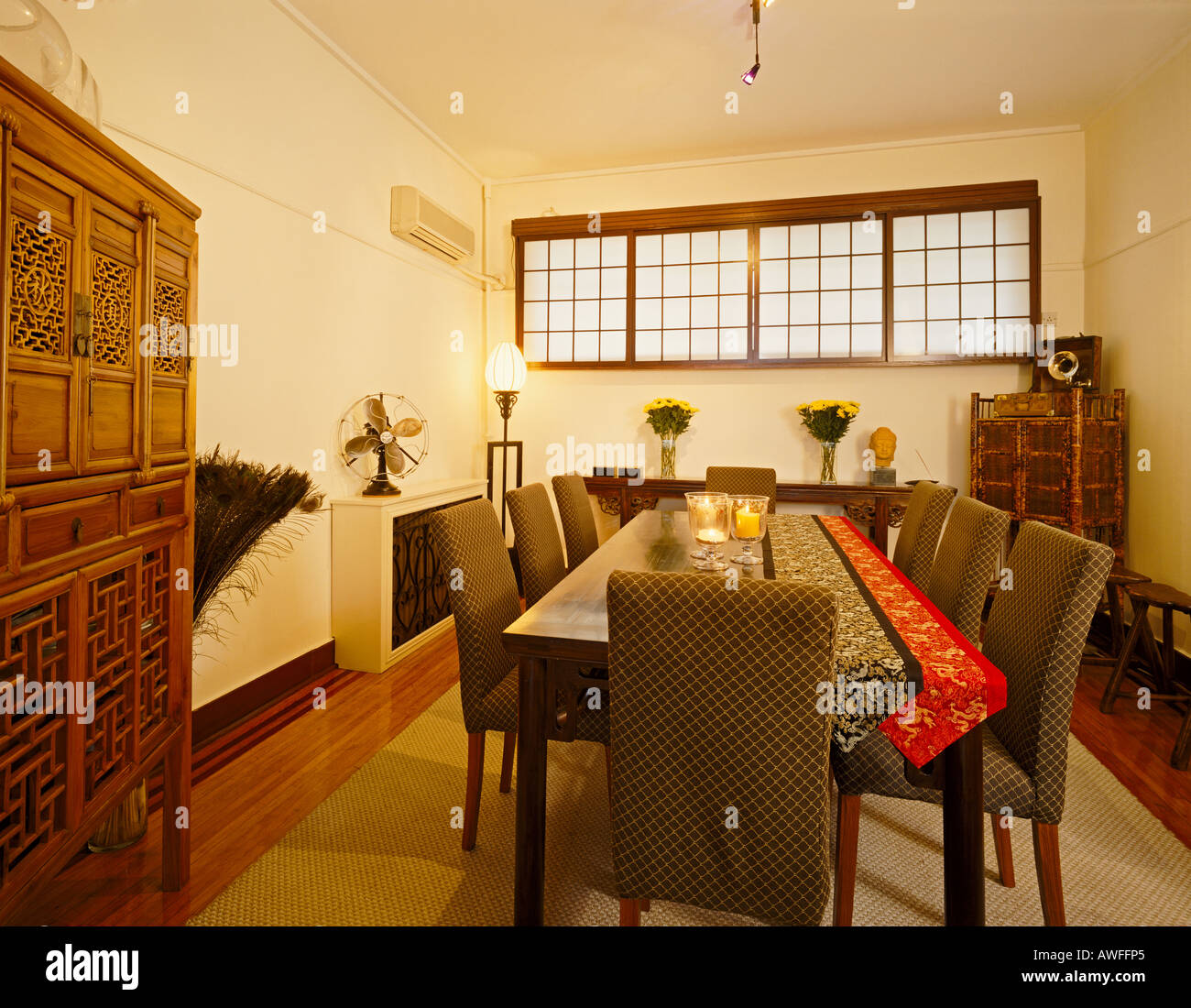 Dining room of a Shanghai art decor apartment located in The Gascogne Shanghai China Stock Photo