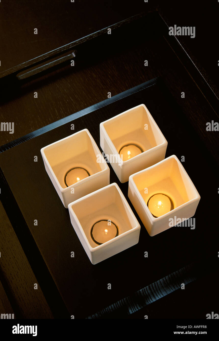 Ceramic candle holders in modern Grosvenor Apartments Shanghai China Stock Photo