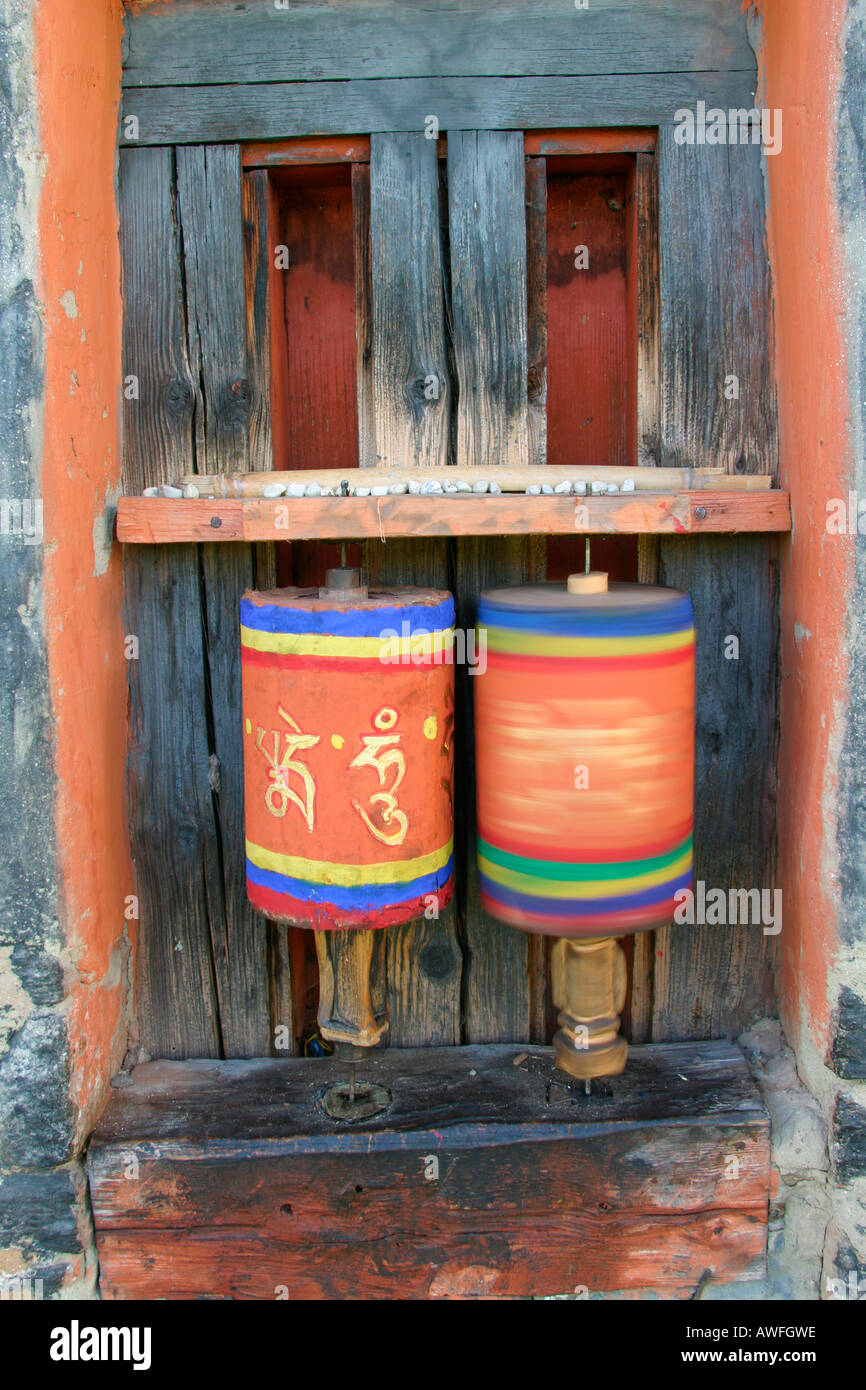 Tibetan spinning prayer wheels Stock Photo
