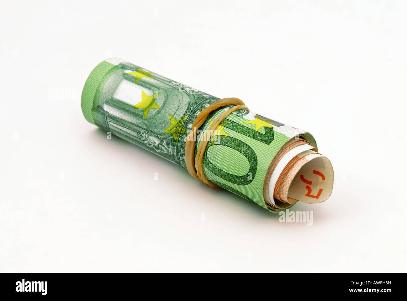 Euro bills rolled up, held together with an elastic Stock Photo