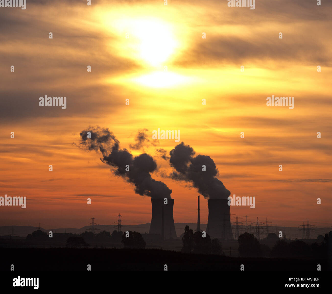 Nuclear power plant cooling towers in a colourful evening sky Stock ...