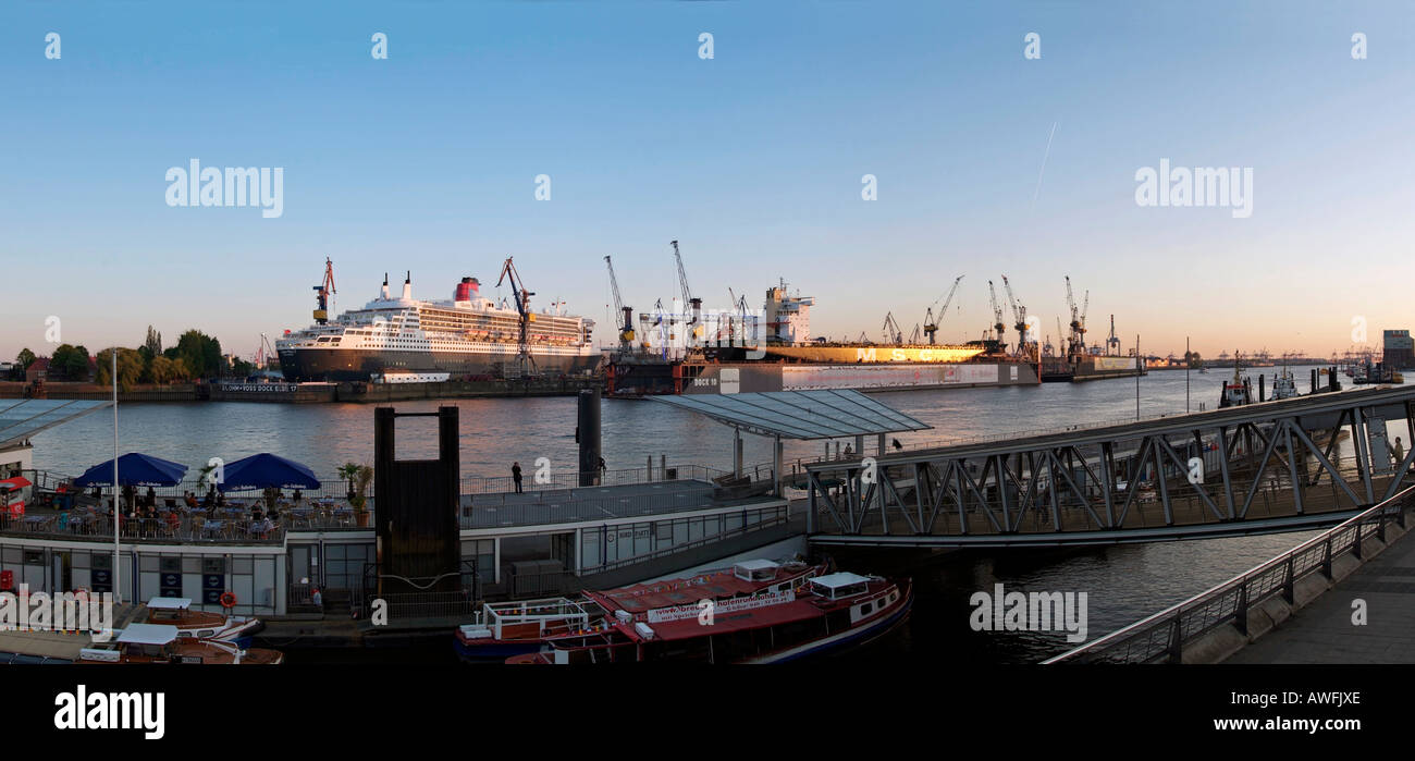 QM2 Germany Hamburg Harbour Elbe skyline Landungsbruecken Queen Mary Docks Stock Photo