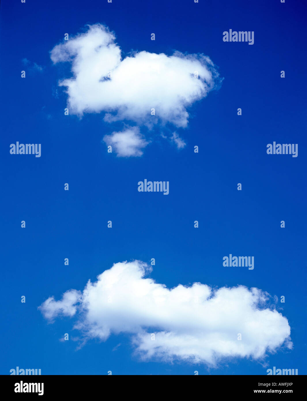Cumulus clouds in a blue sky Stock Photo