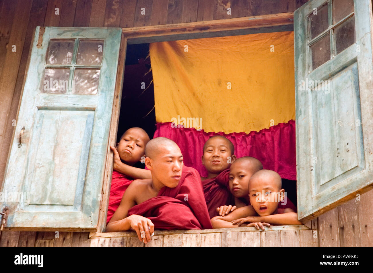 Stock photograph of monks at the monastery near the village of Tayaw of the Palaung hill tribe near Kalaw in Myanmar Stock Photo