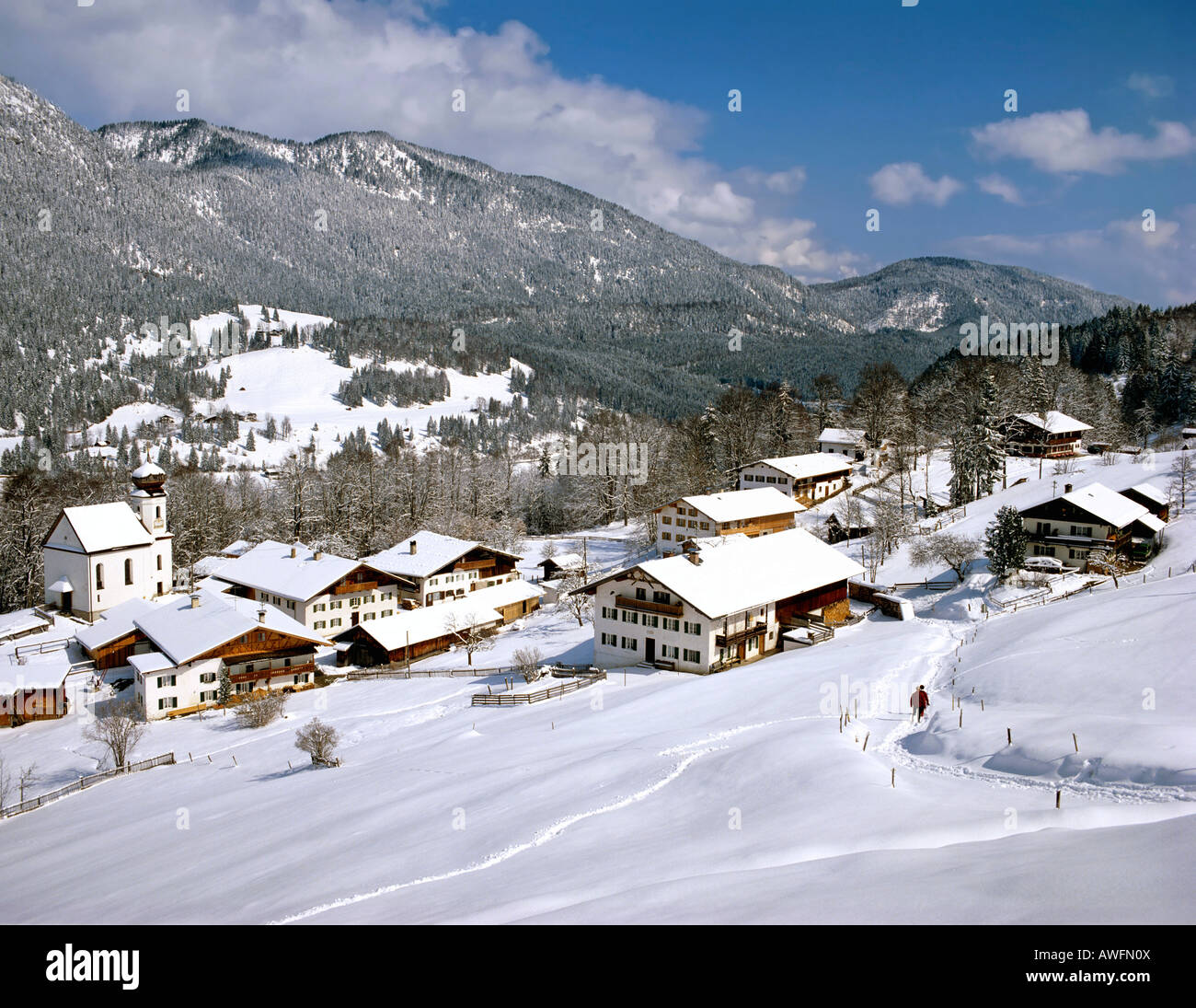 Farmhouses in the town of Wamberg with the Ester Range in the background, wintertime, Upper Bavaria, Bavaria, Germany, Europe Stock Photo