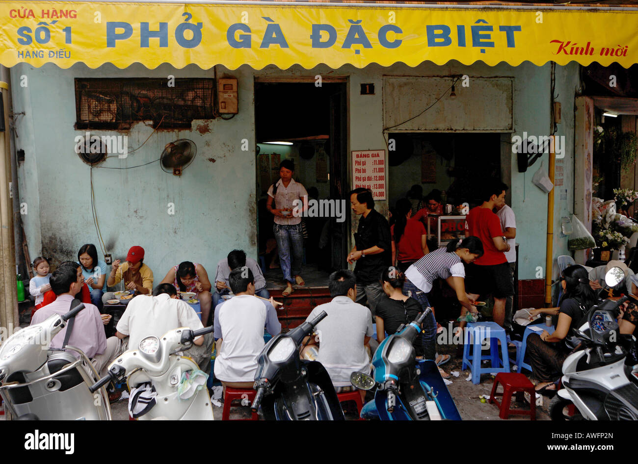 Busy street restaurant in the old part of town, Hanoi, Vietnam, Asia ...