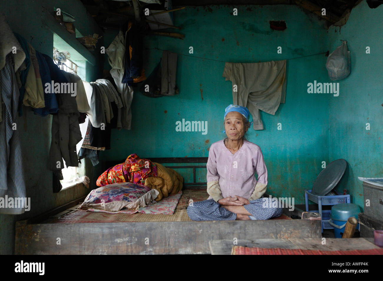 Quack Thi Thih, 71, in her home almost completly destroyed by a flood, Lien Hoa, Hoa Bin Province, Vietnam, Asia Stock Photo