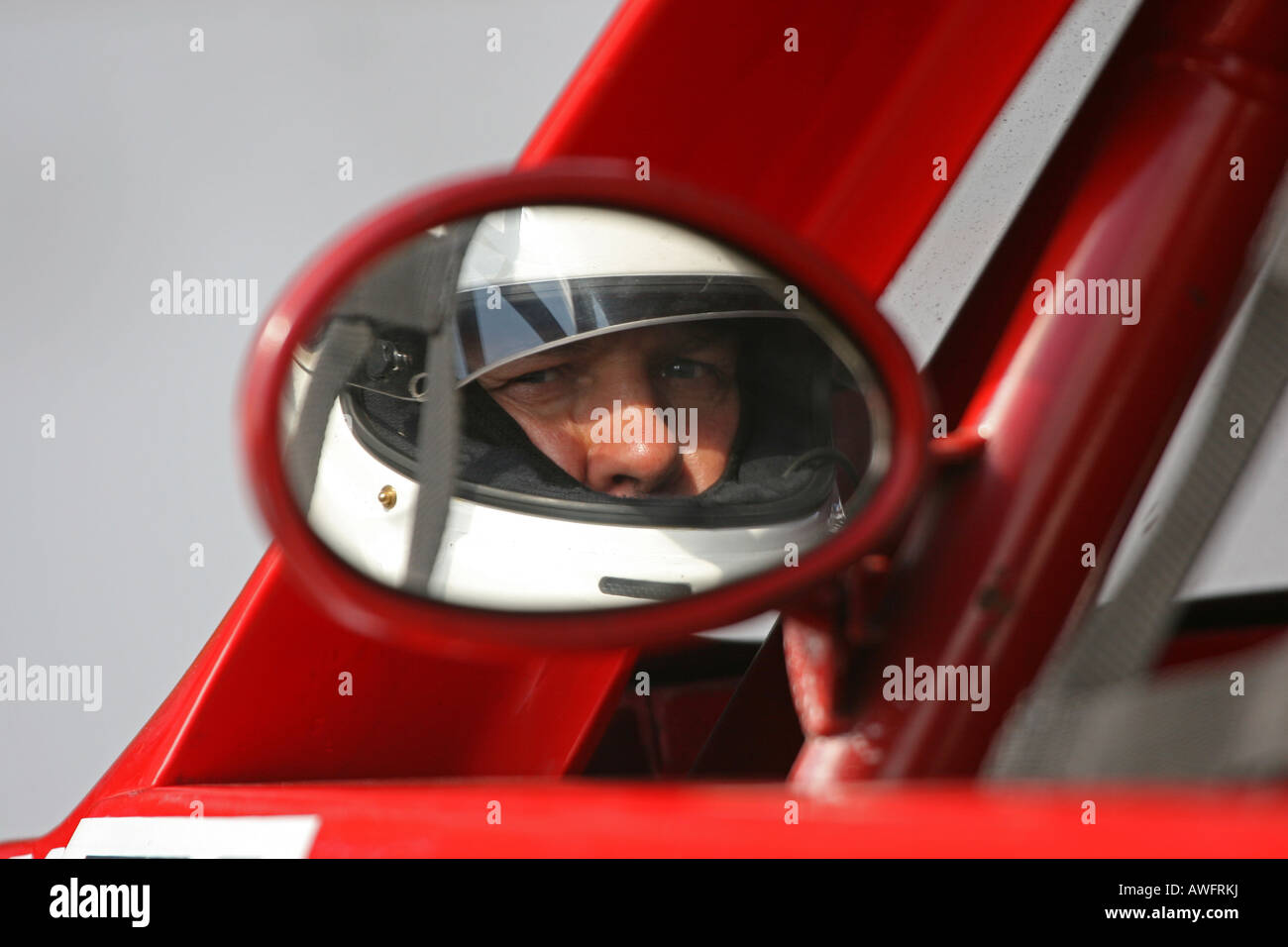 Reflection of a driver in the mirror of a racing pick up truck Stock ...