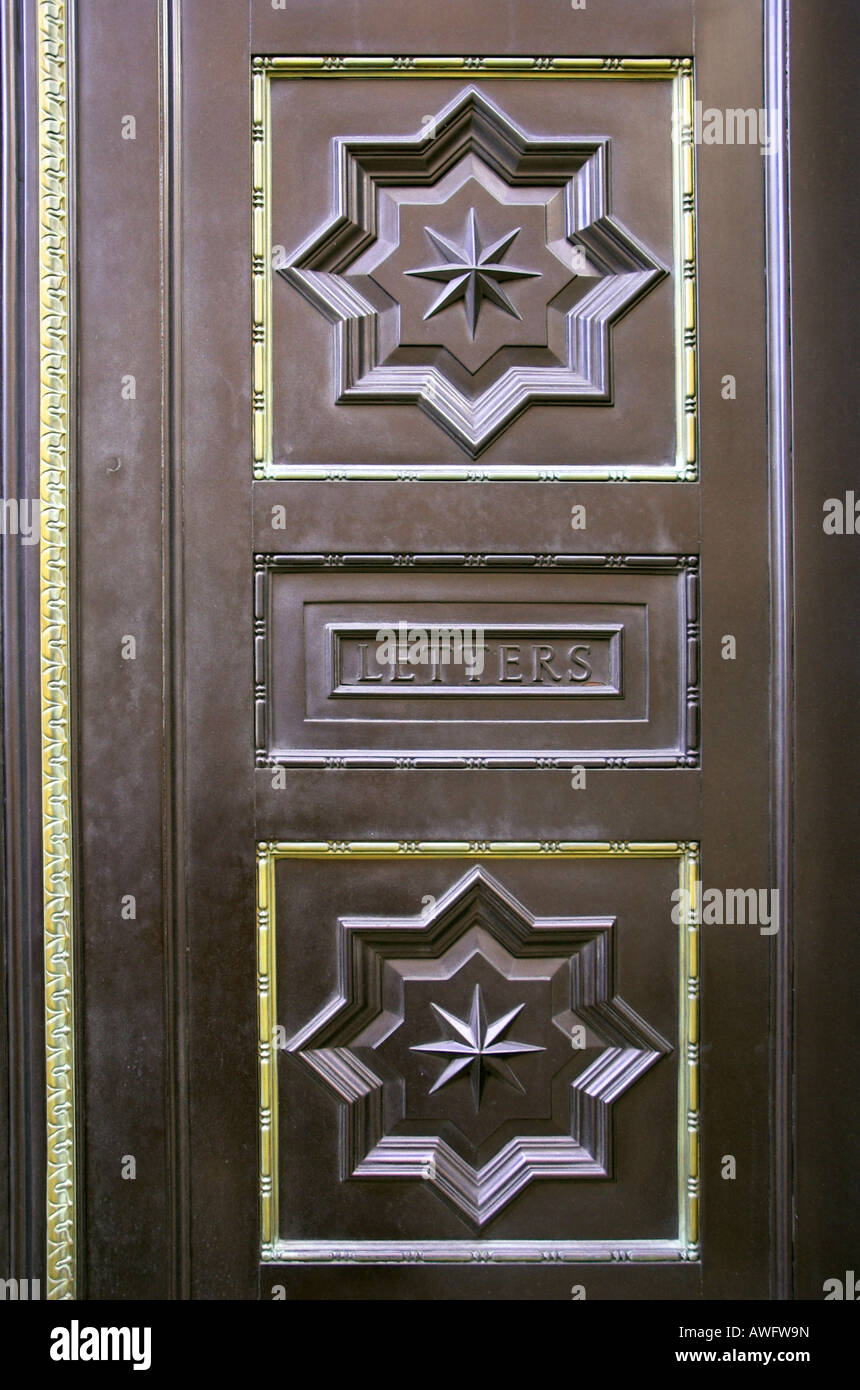 A letter box in a door to a building on Millbank in London Stock Photo