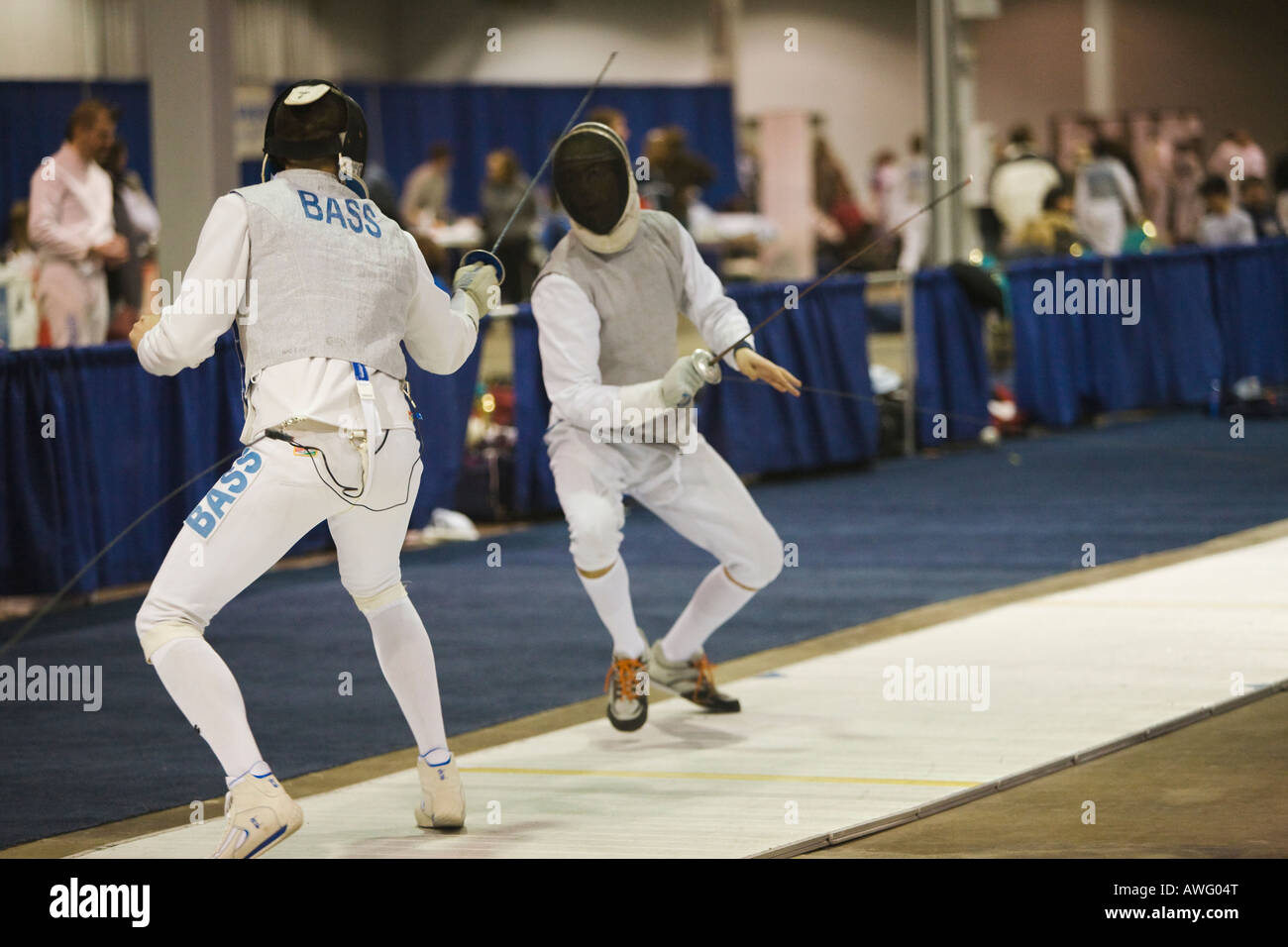 SPORTS Fencing competition bout male foil competitors on strip during