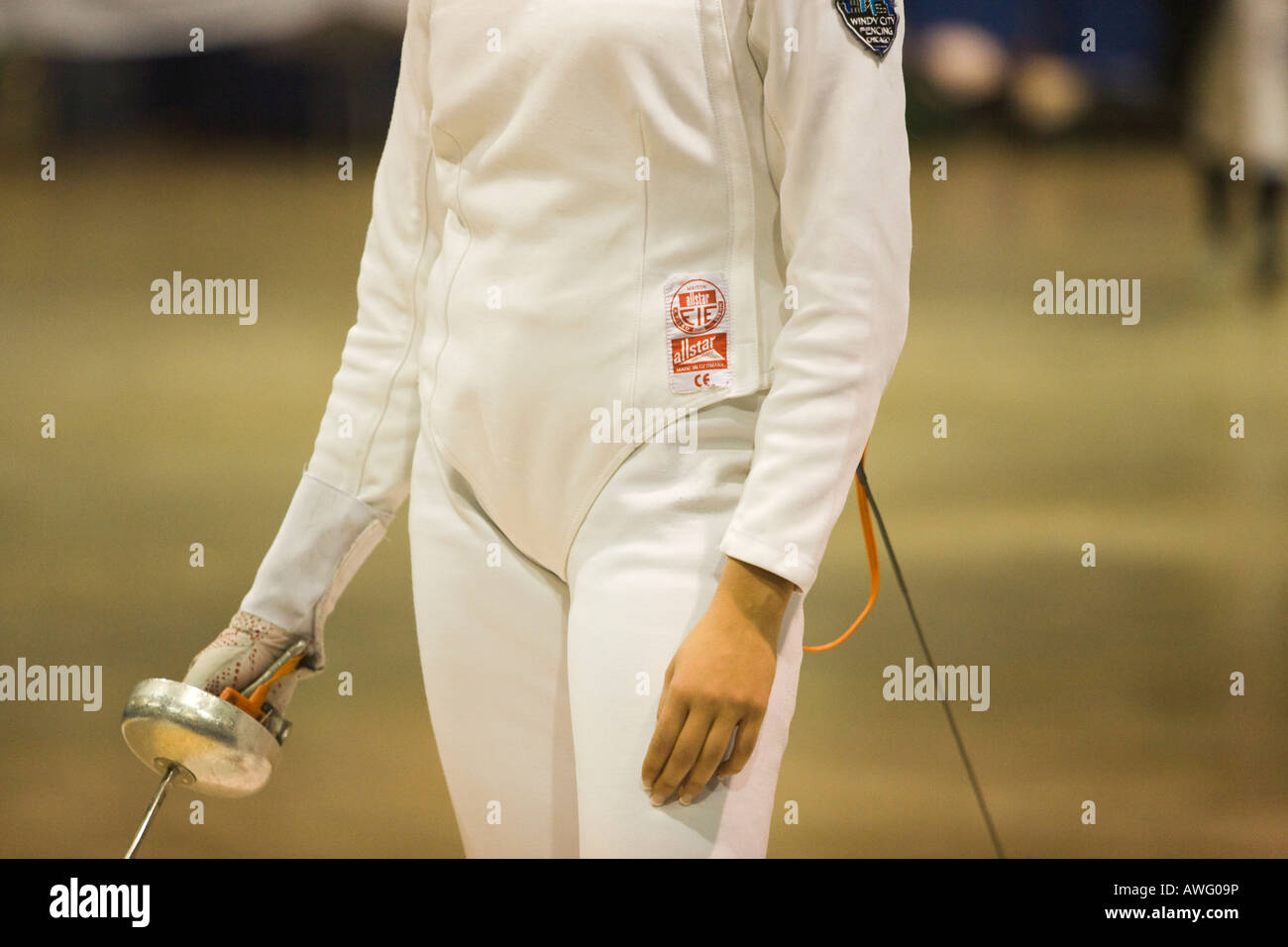 SPORTS Fencing competition female competitor holding epee weapon view