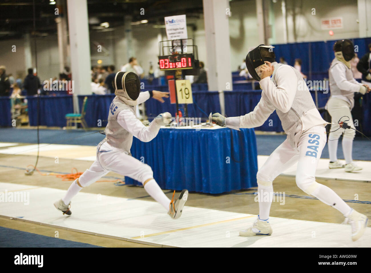SPORTS Fencing competition bout male foil competitors on strip during