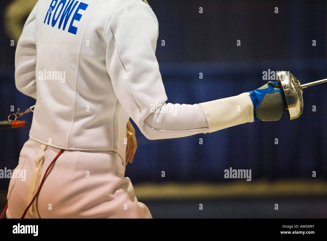 SPORTS Fencing competition woman holding epee weapon ready position