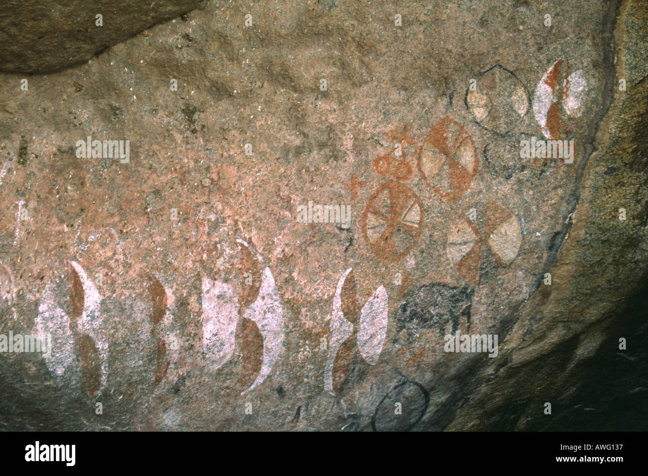 Masai warriors rock art at Moru Kopjes on Serengeti Plains Tanzania Stock Photo