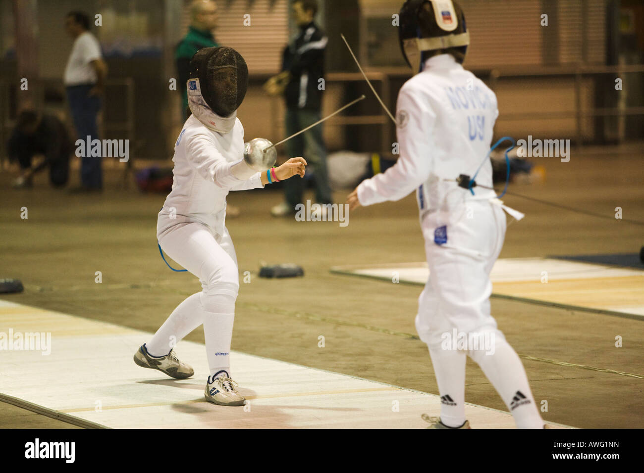 SPORTS Fencing competition two women competing on strip using epee