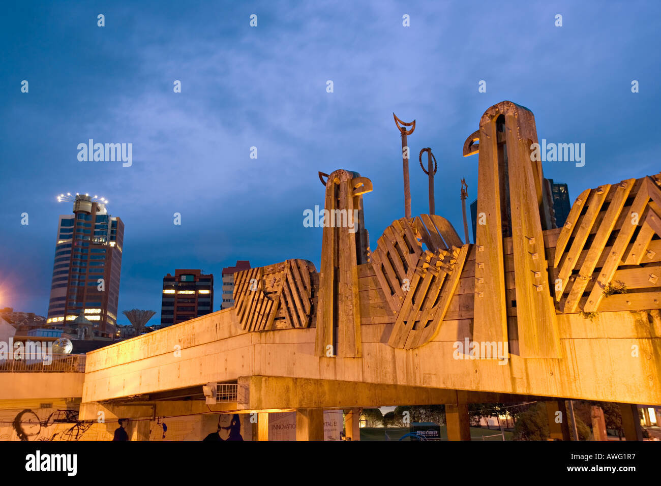 Wooden sculpture on the bridge that connects the harbourfront to the civic square, Wellington, New Zealand Stock Photo