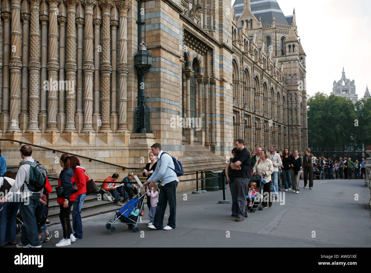 Tourists line up and queue outside the world famous Natural History