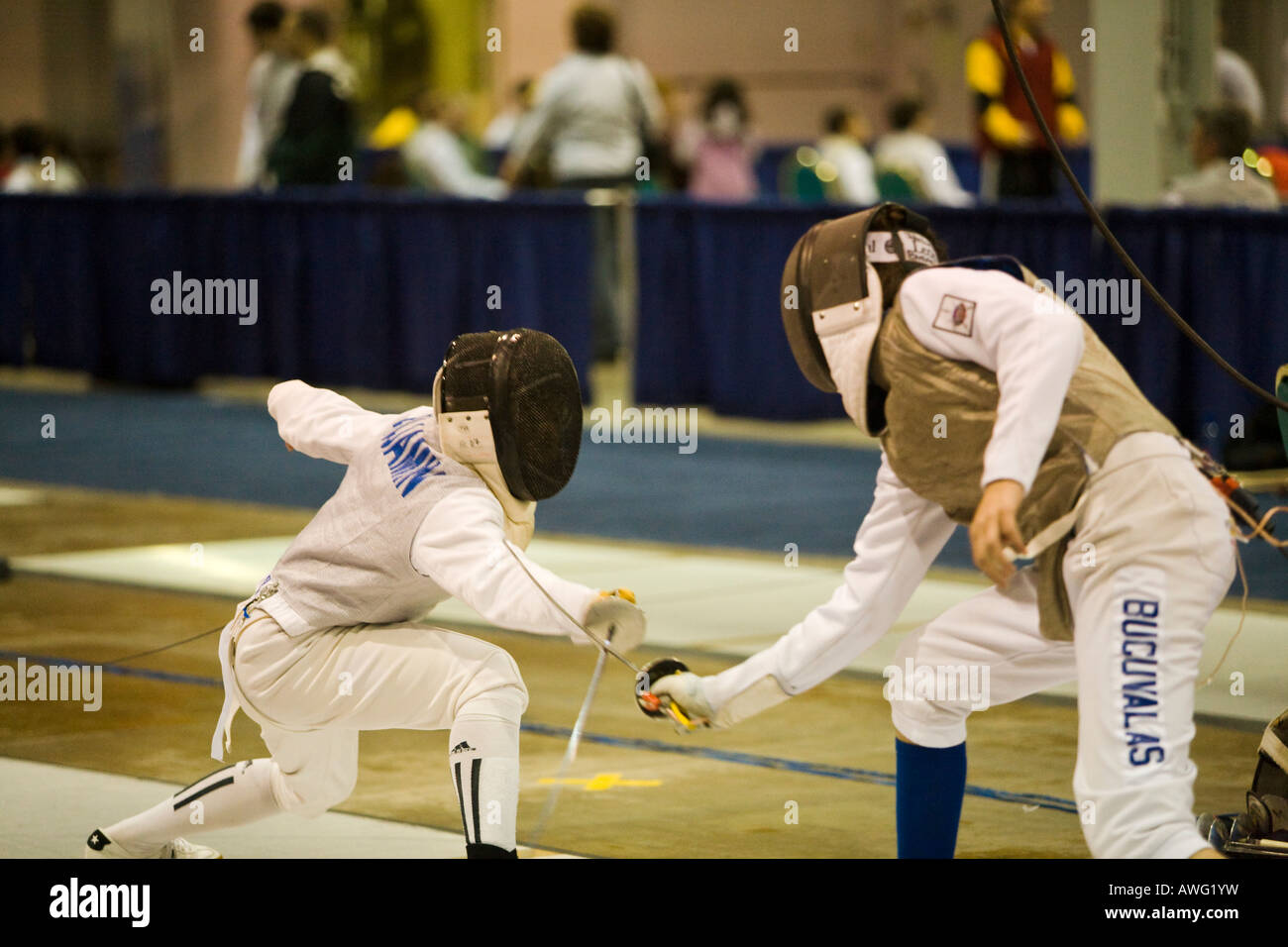SPORTS Fencing competition bout male foil competitors on strip during