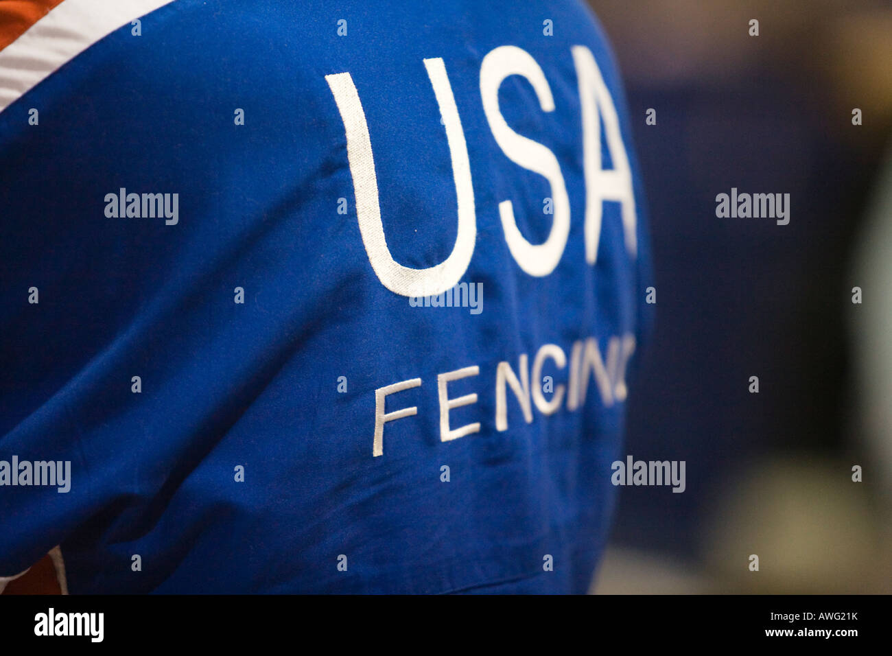 SPORTS Fencing competition USA fencing embroidered on back of blue