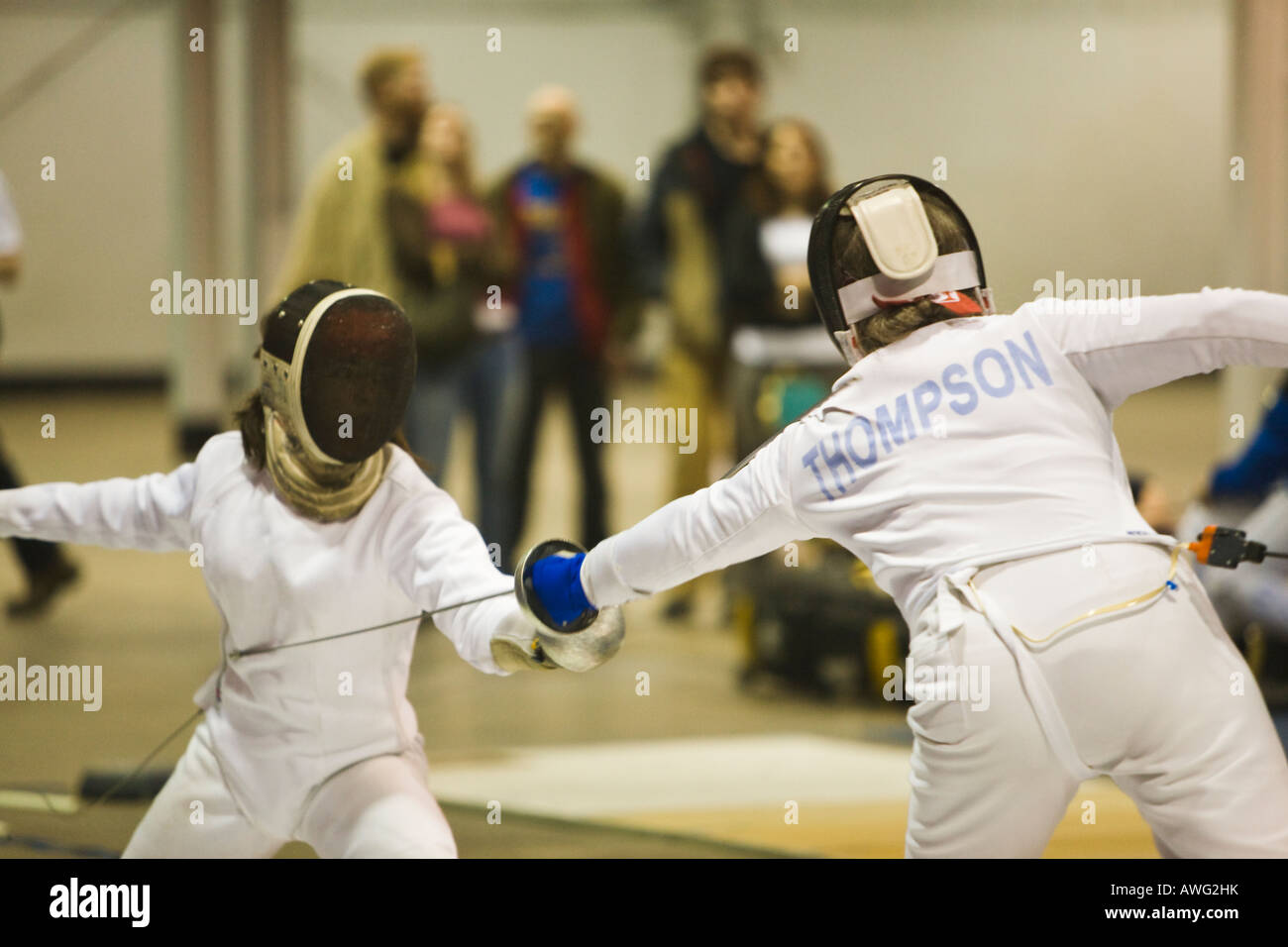 SPORTS Fencing competition two women competing on strip using epee