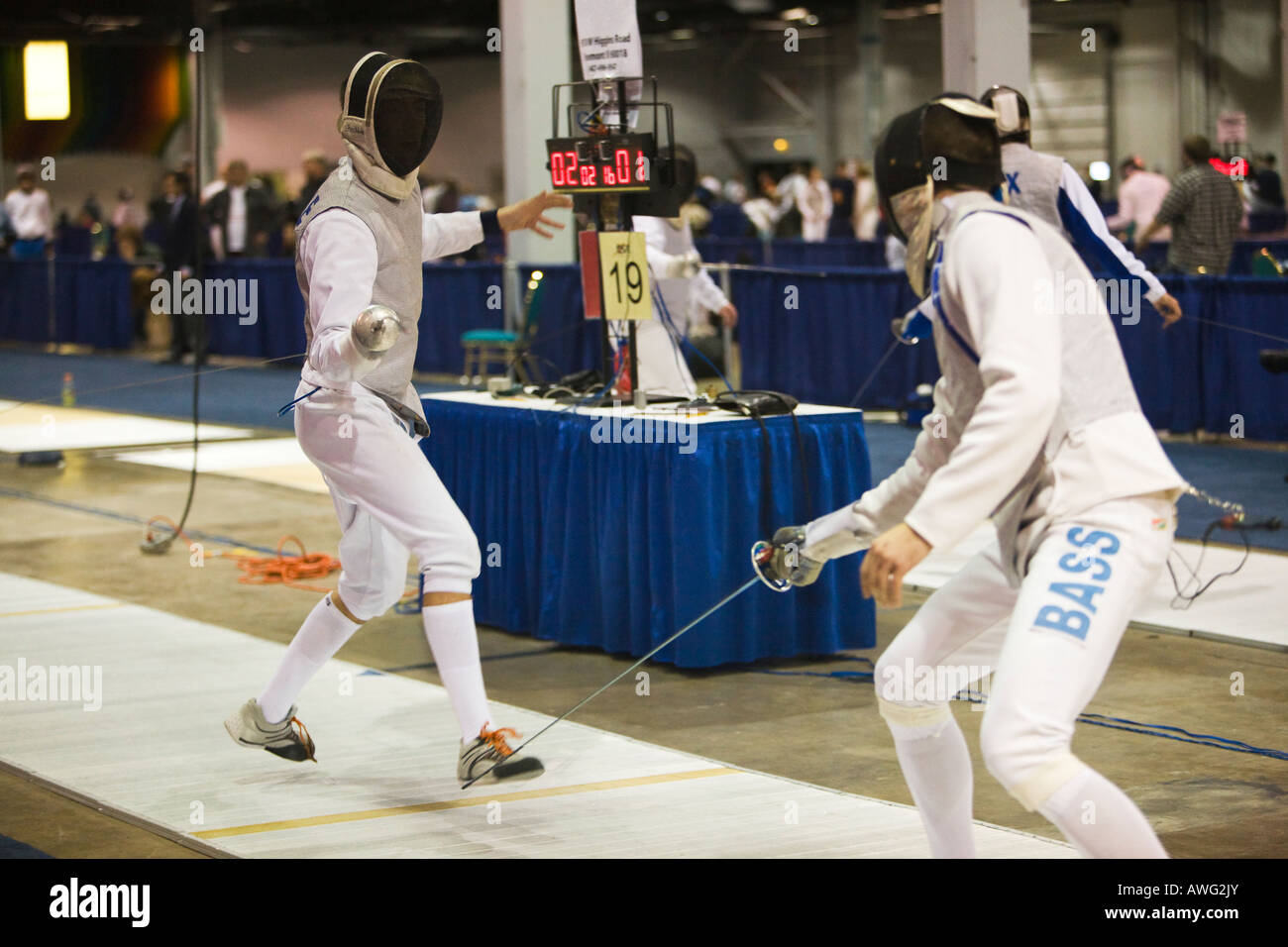 SPORTS Fencing competition bout male foil competitors on strip during