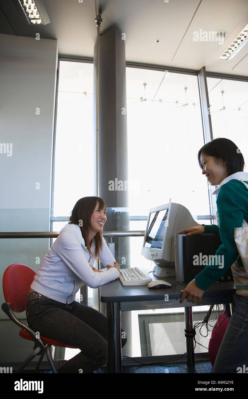 Two women talking new zealand hi-res stock photography and images - Alamy