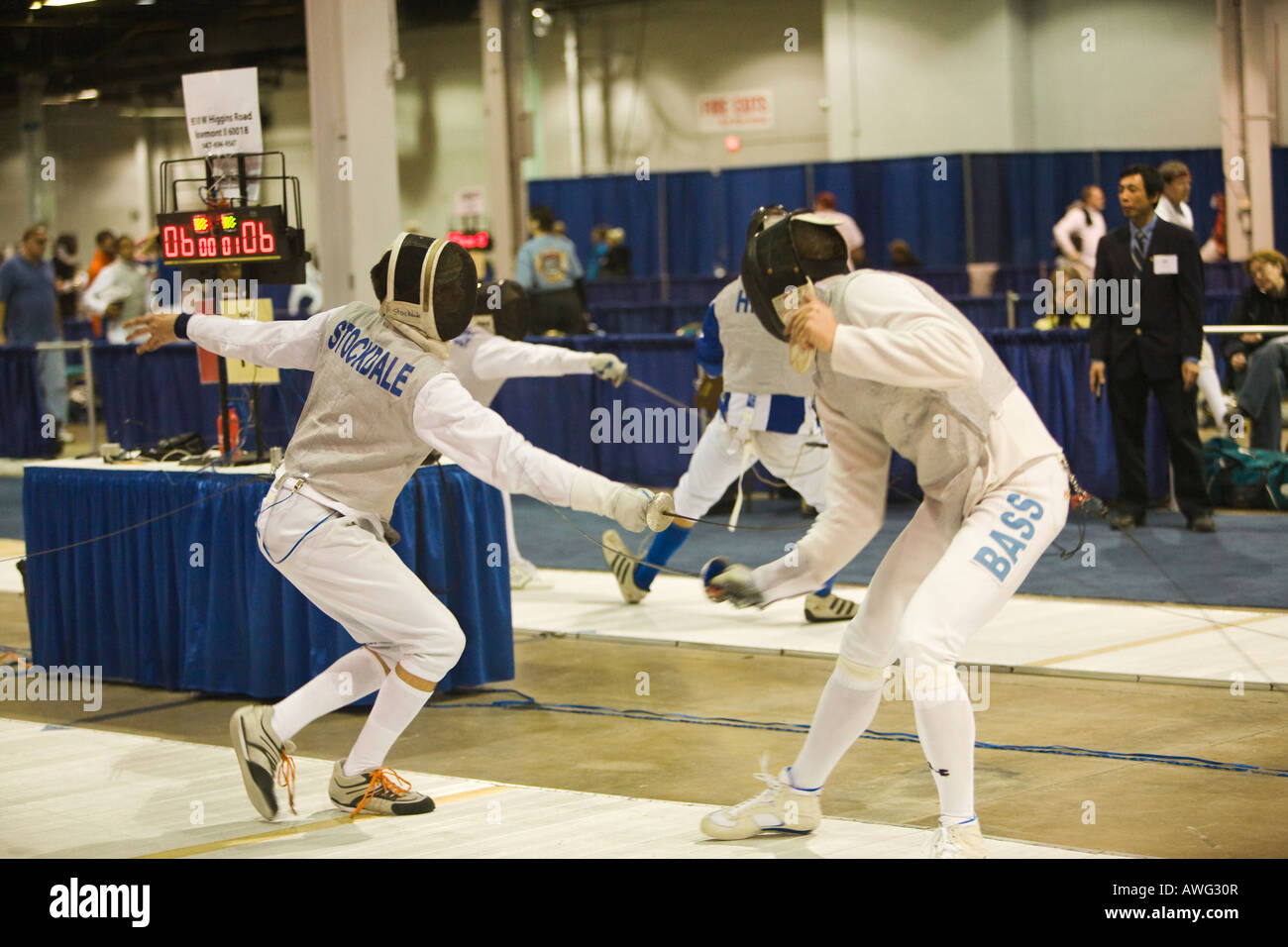 SPORTS Fencing competition bout male foil competitors on strip during