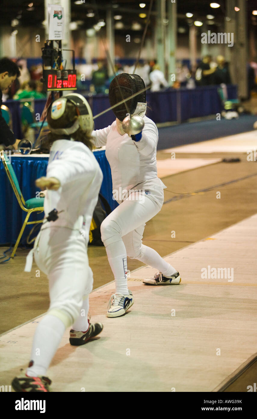 SPORTS Fencing competition two women competing on strip using epee