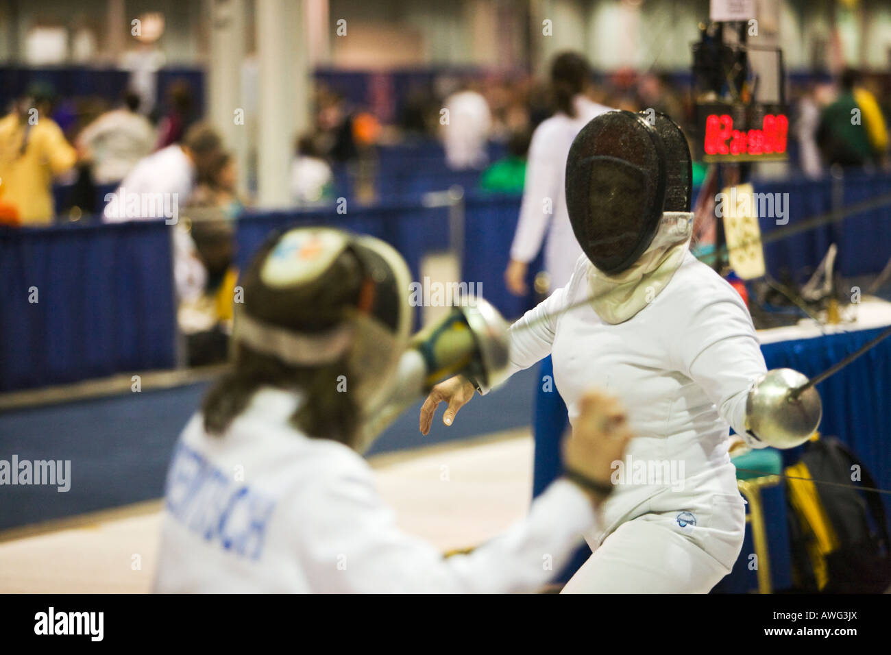 SPORTS Fencing competition two women competing on strip using epee