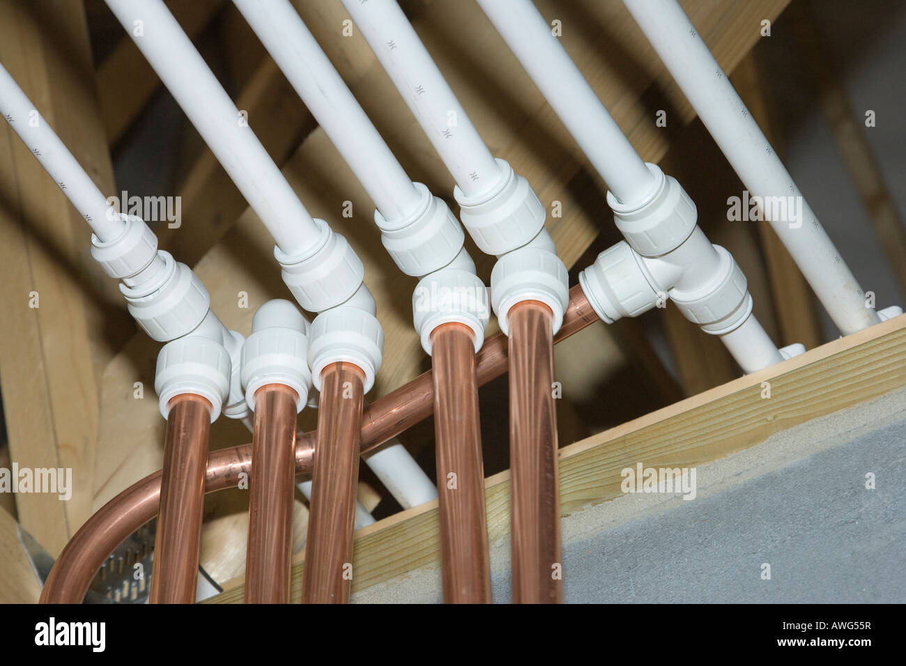 Speedfit polyethylene water pipes installed in a new house Stock Photo