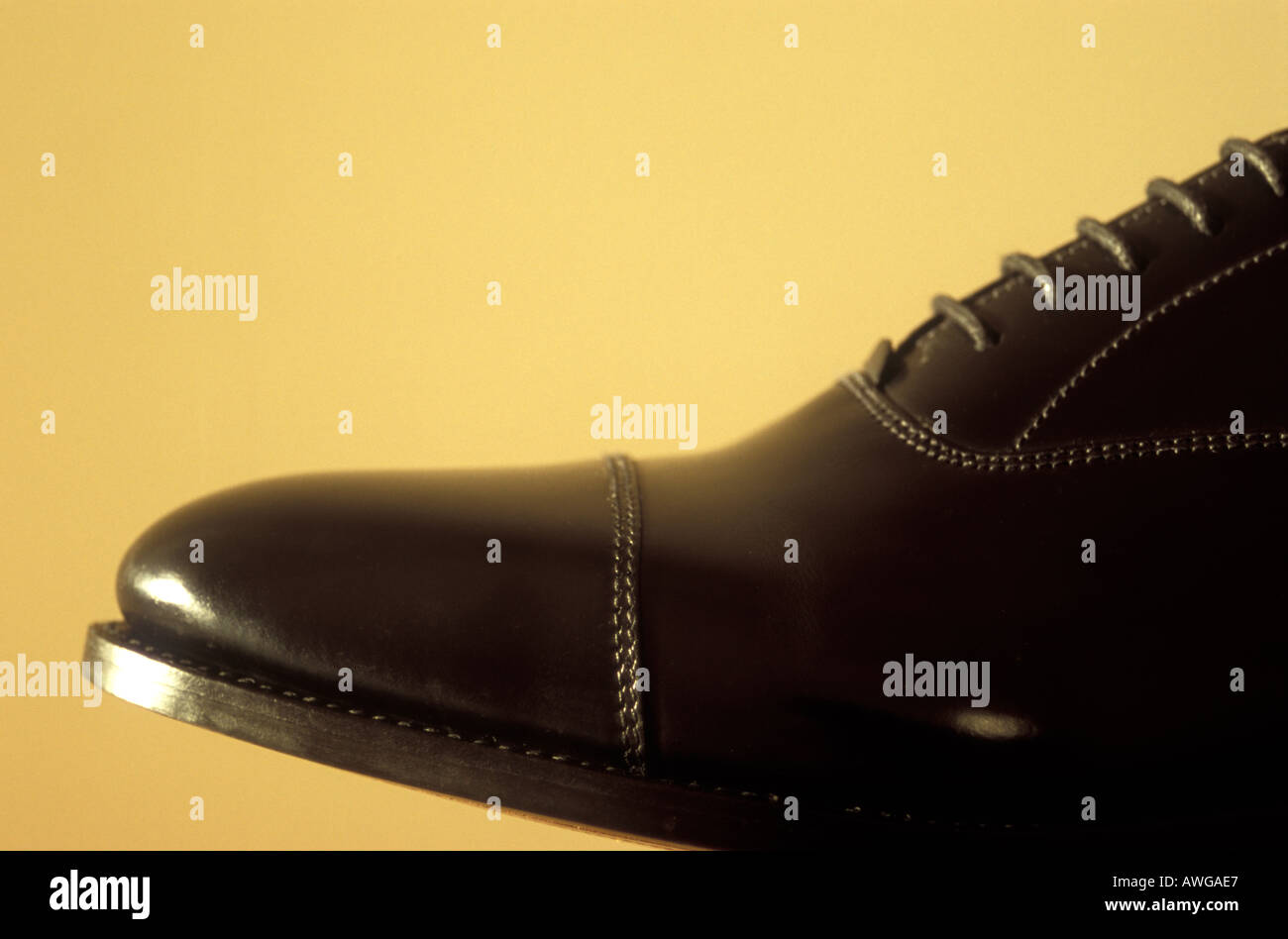 The toe of a black oxford shoe Stock Photo - Alamy
