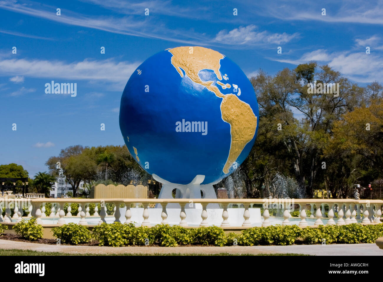 Large World Statue in Front of the On Top Of The World Community in Clearwater Florida USA Stock Photo