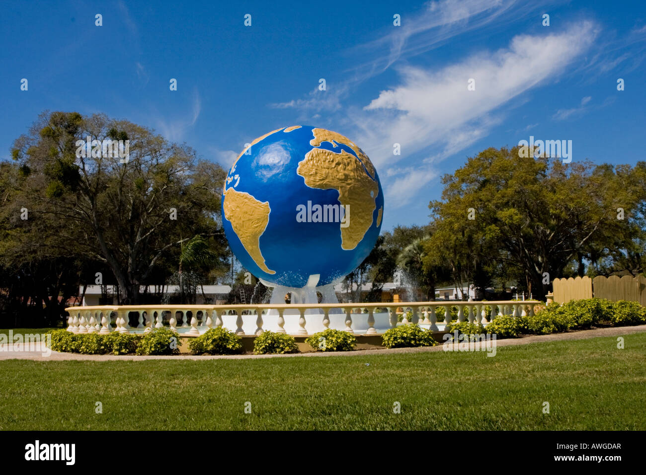 Large World Statue in Front of the On Top Of The World Community in Clearwater Florida USA Stock Photo