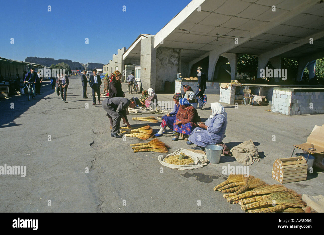 A small outdoor market selling brooms and other items at the Taskent