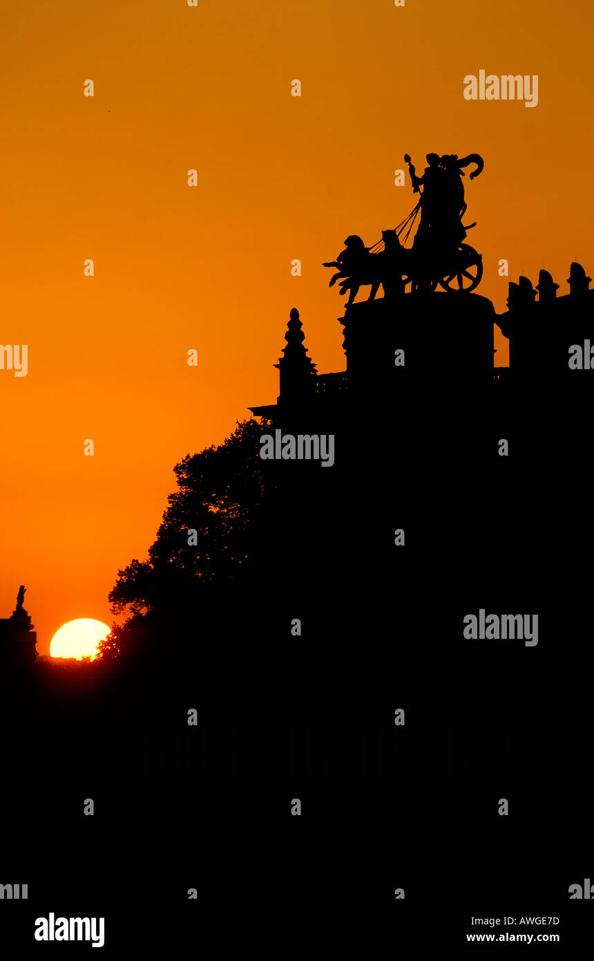 Sunset Chariot silhouette at building fronton Stock Photo
