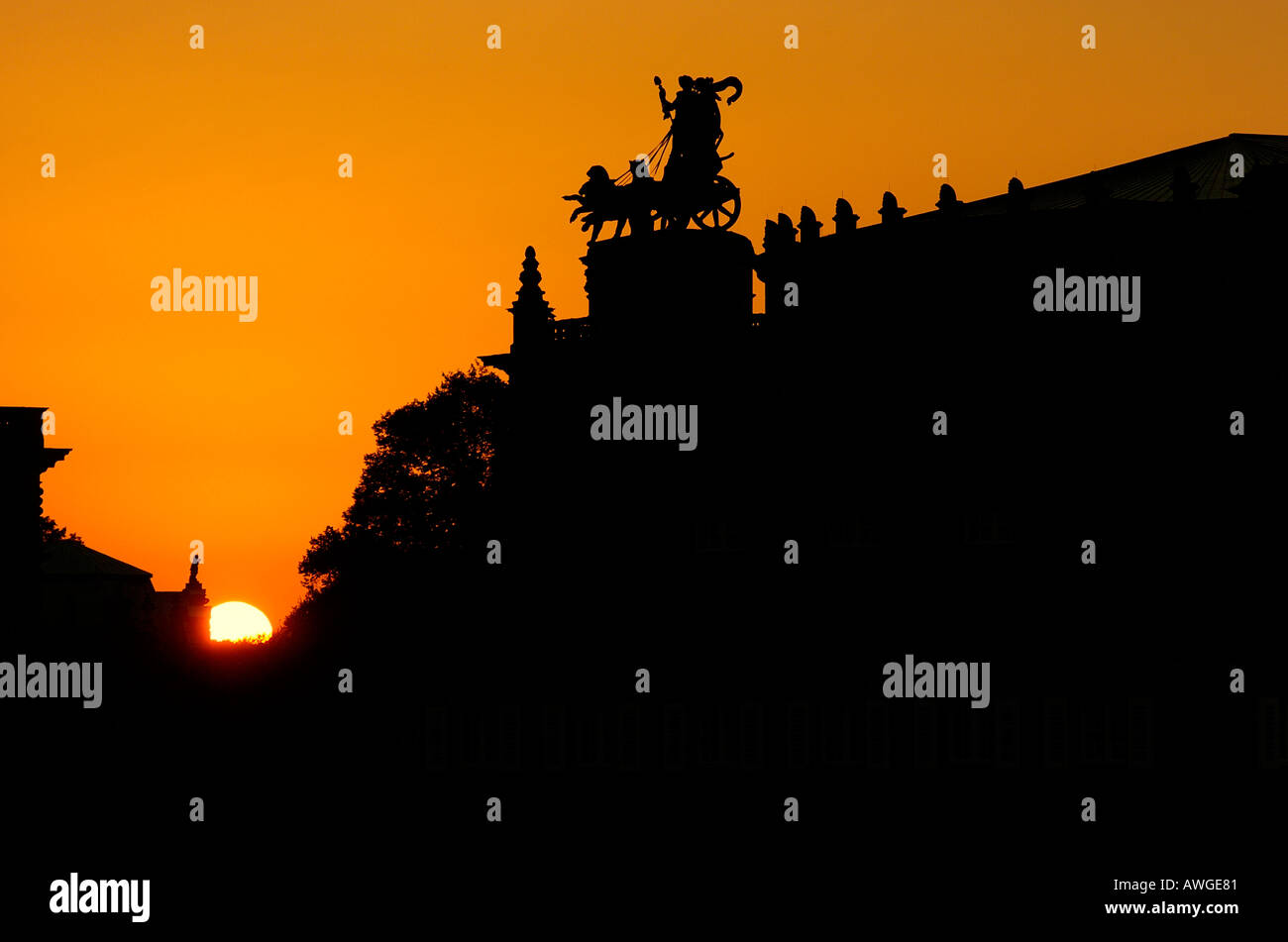 Sunset Chariot silhouette at building fronton Stock Photo - Alamy
