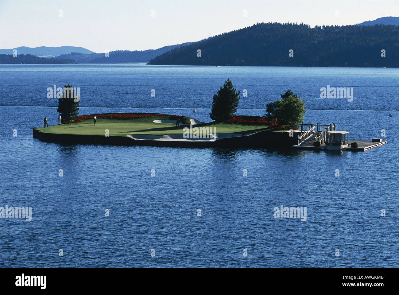 USA, Idaho, Couer d'Alene Resort, unique floating golf green on 14th hole located on Lake Couer d'Alene Stock Photo