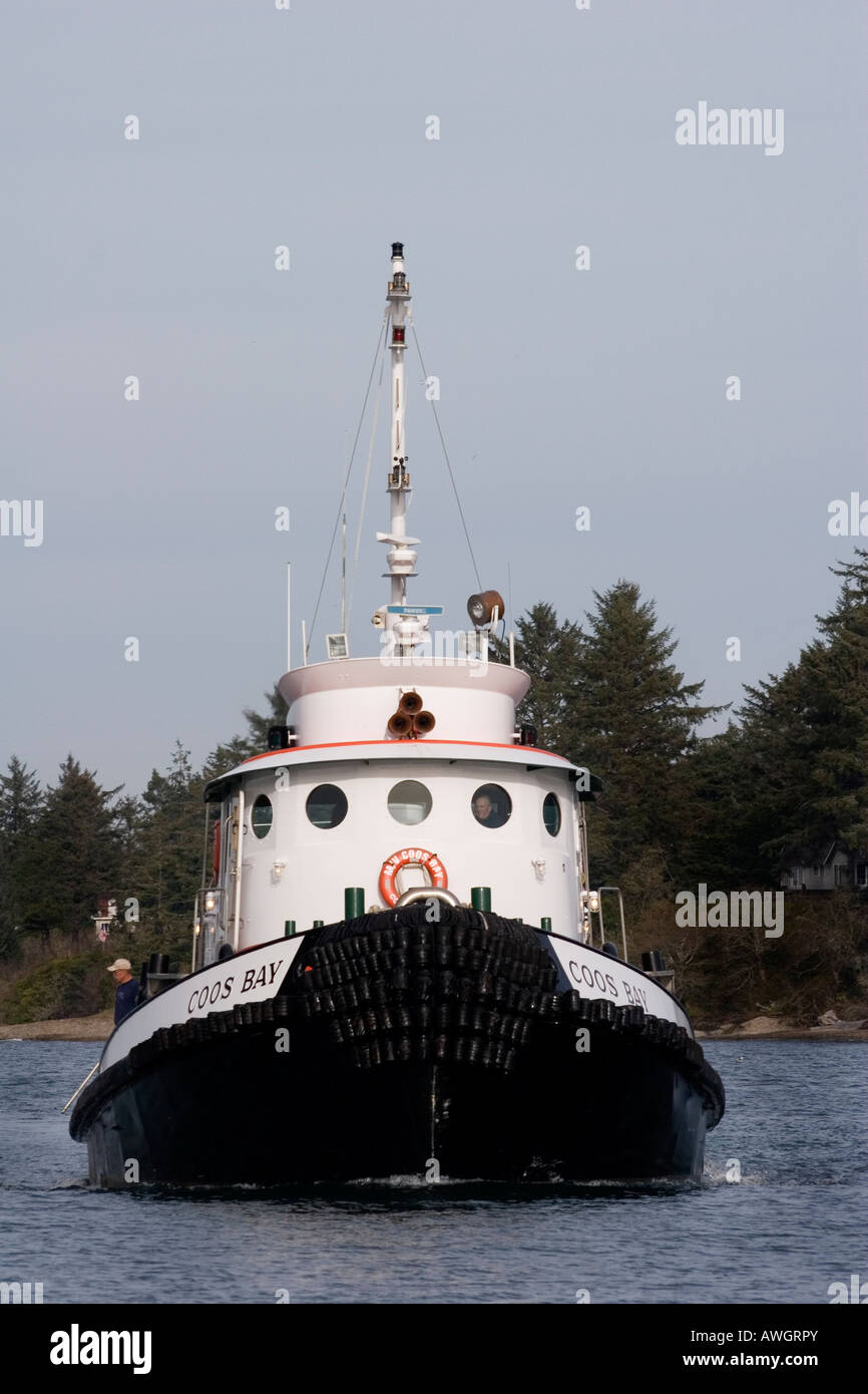 Tugboat heads for the dock in Coos Bay Oregon Stock Photo