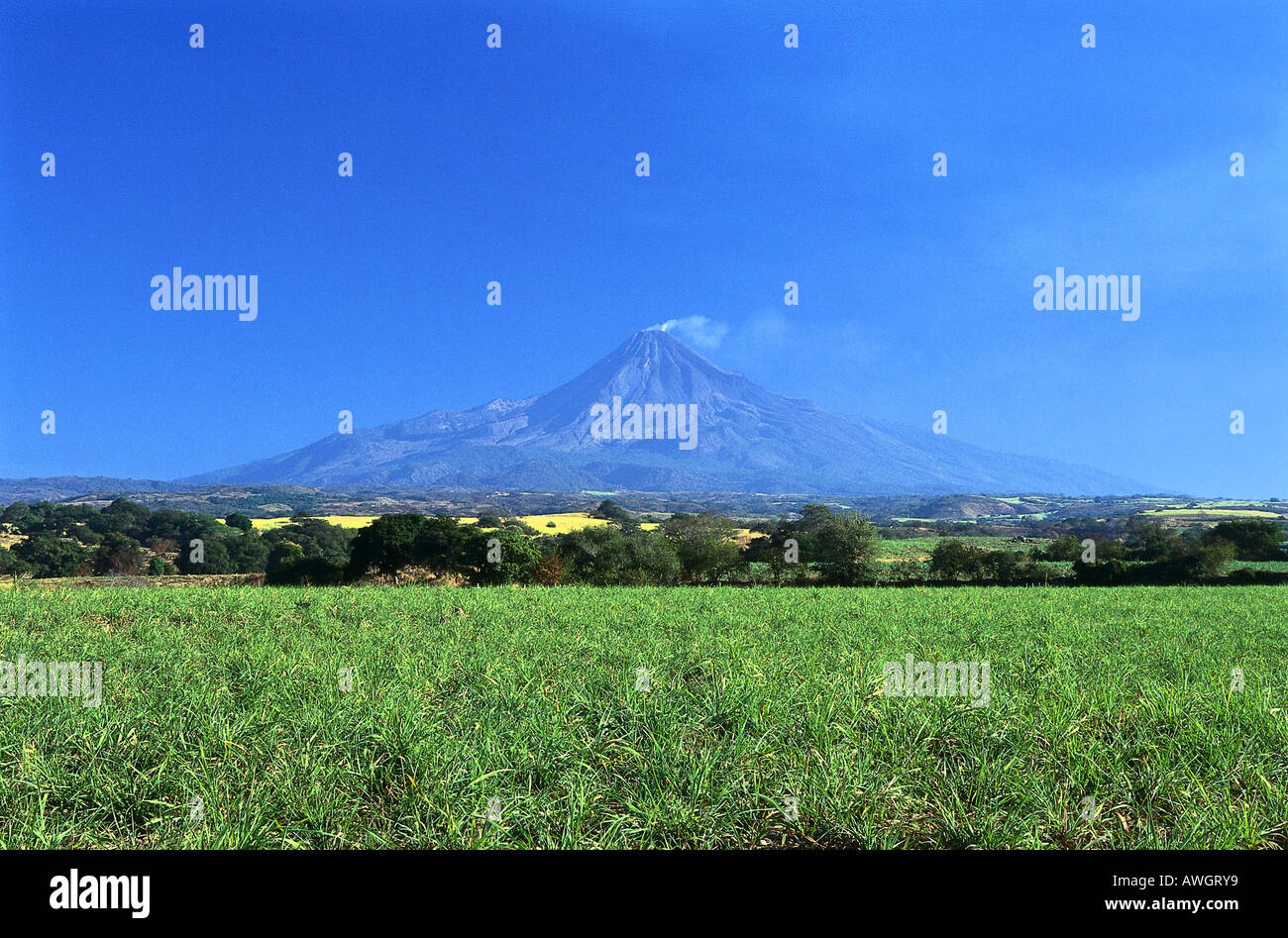 Volcan de Fuego, seen from the road heading out of Colima toward Guadalajara, Mexico. Stock Photo