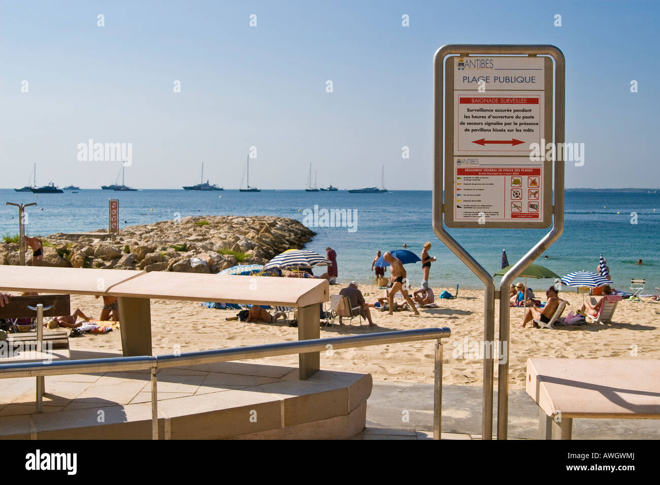 Antibes Juan les Pins public beach people and beach rules sign Stock Photo