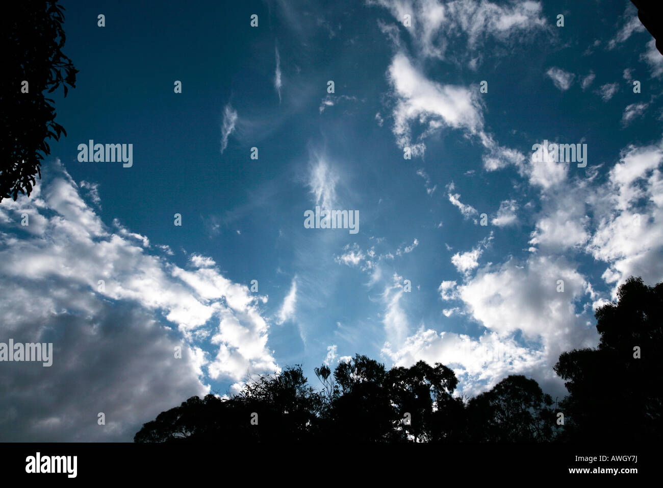 Stratocumulus and Cirrus clouds Stock Photo