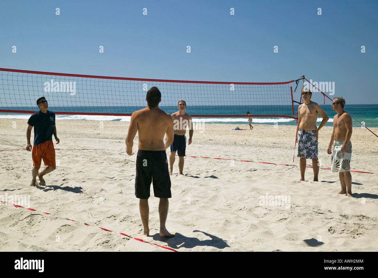 Men playing beach volleyball Pacific Beach San Diego California USA