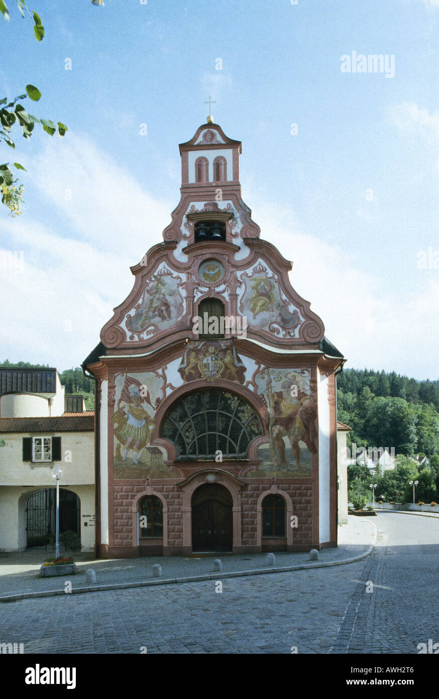Germany, Bavaria, The Allgäu, Füssen, Heilig-Geist-Spitalkirche, pianted façade church decorated Lüftlmalerei Joseph Anton Stock Photo
