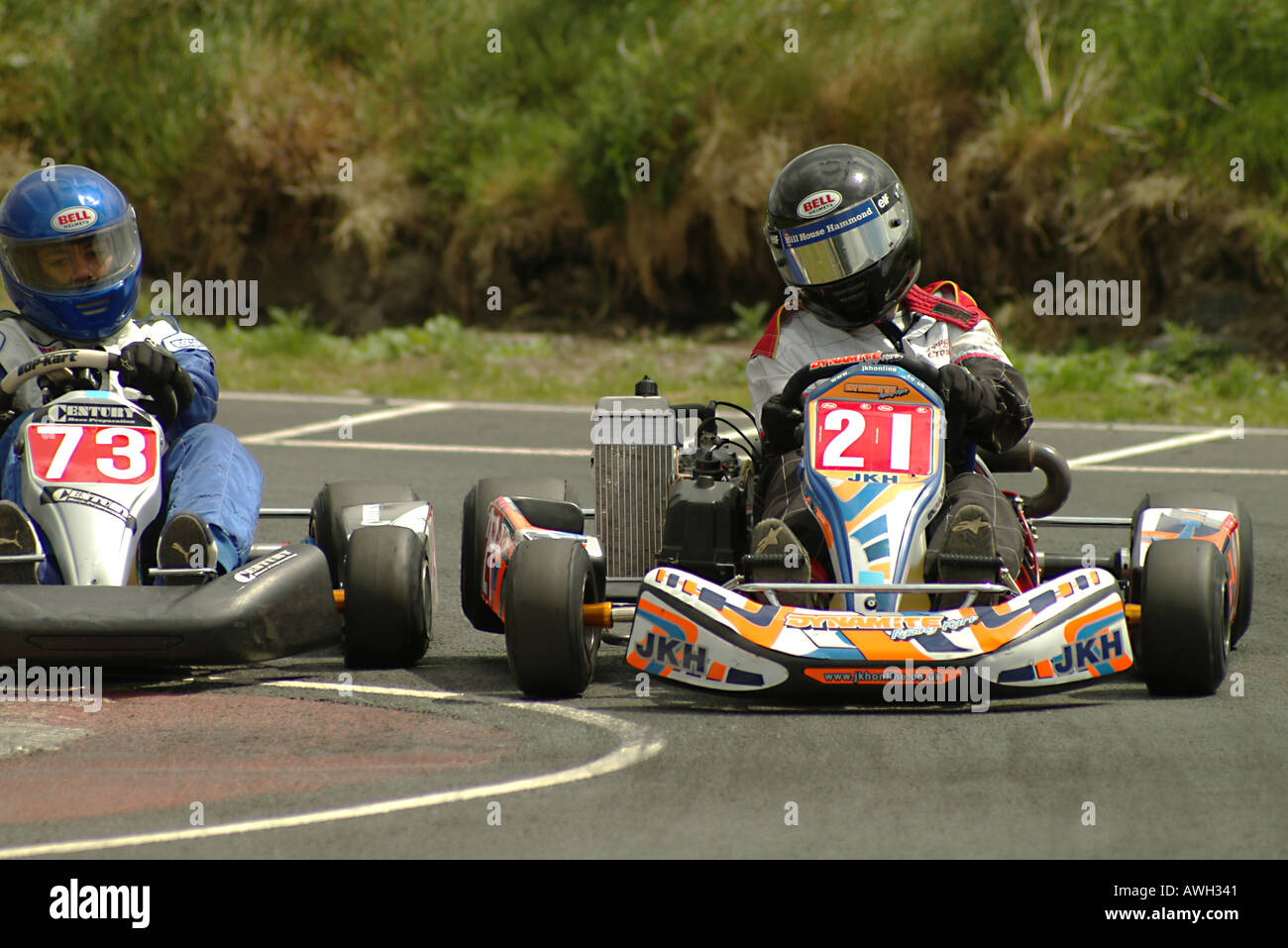 Kart racers in Motorsport action Stock Photo