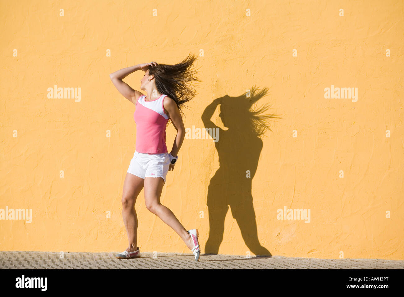 Young woman dancing on the street Stock Photo